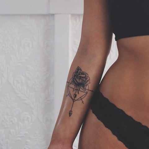 Two rose flowers pierced by arrow tattoo Vector Image