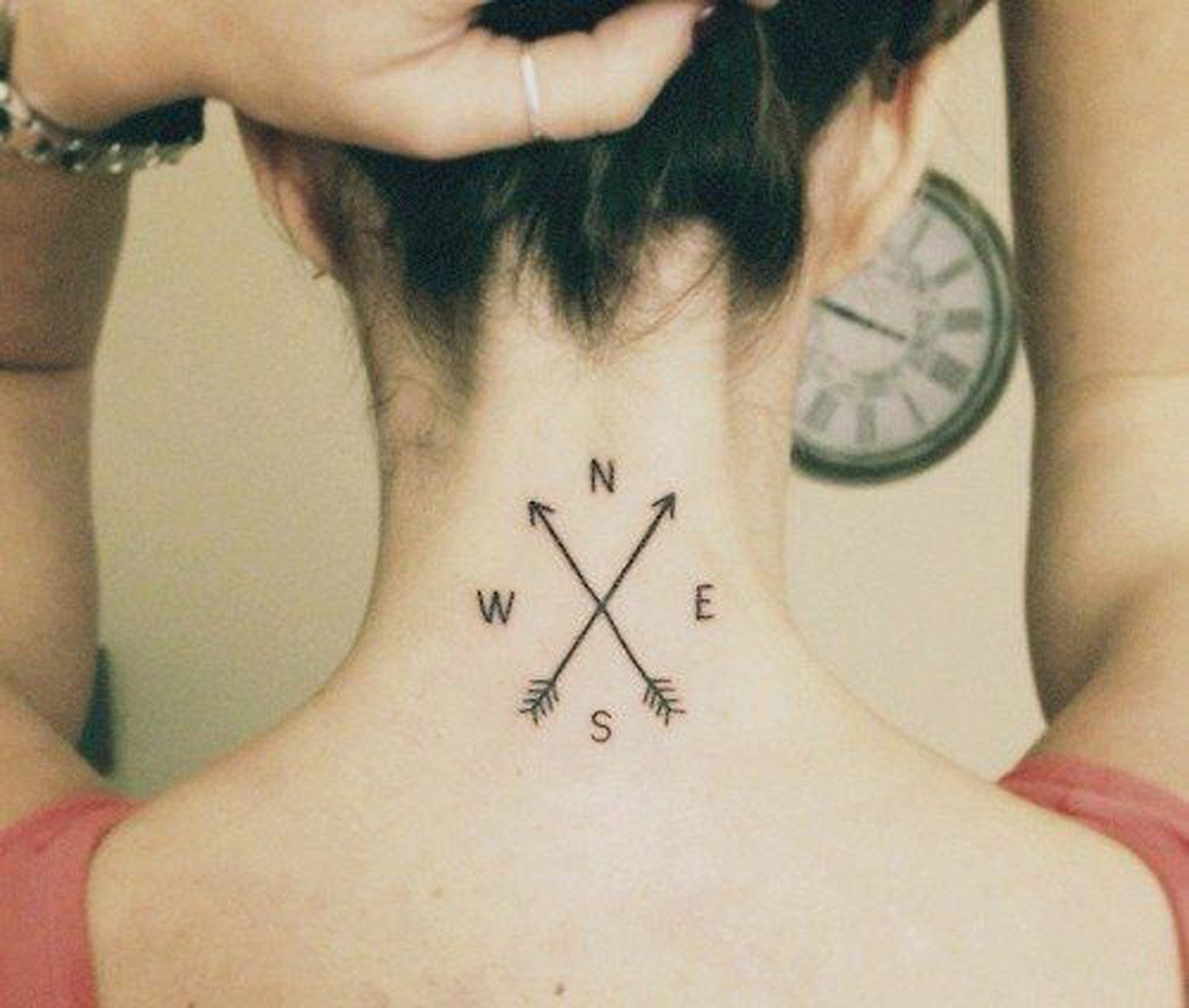 Simple Arrow Compass N E S W Back of Neck Tattoo Ideas for Women - MyBodiArt.com