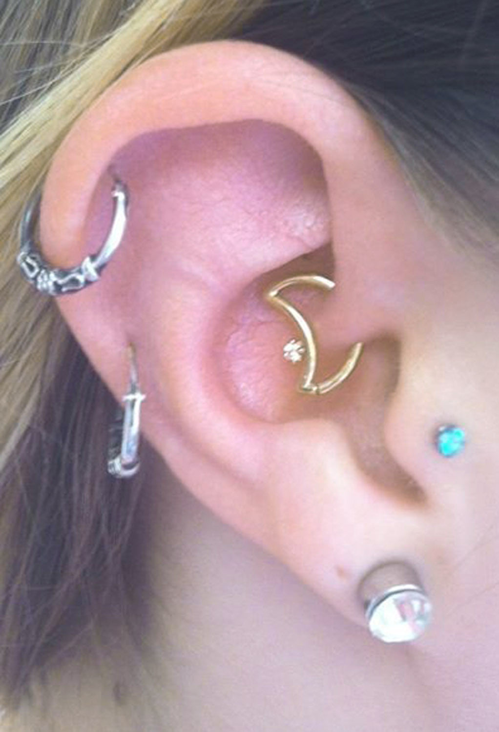 Most Gorgeous Multiple Ear Piercing Ideas at MyBodiArt.com - Cartilage Piercing Hoop, Moon Rook Earring, Tragus Stud, Helix Ring
