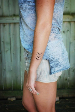 Small Triple Arrow Arm Tattoo at MyBodiArt