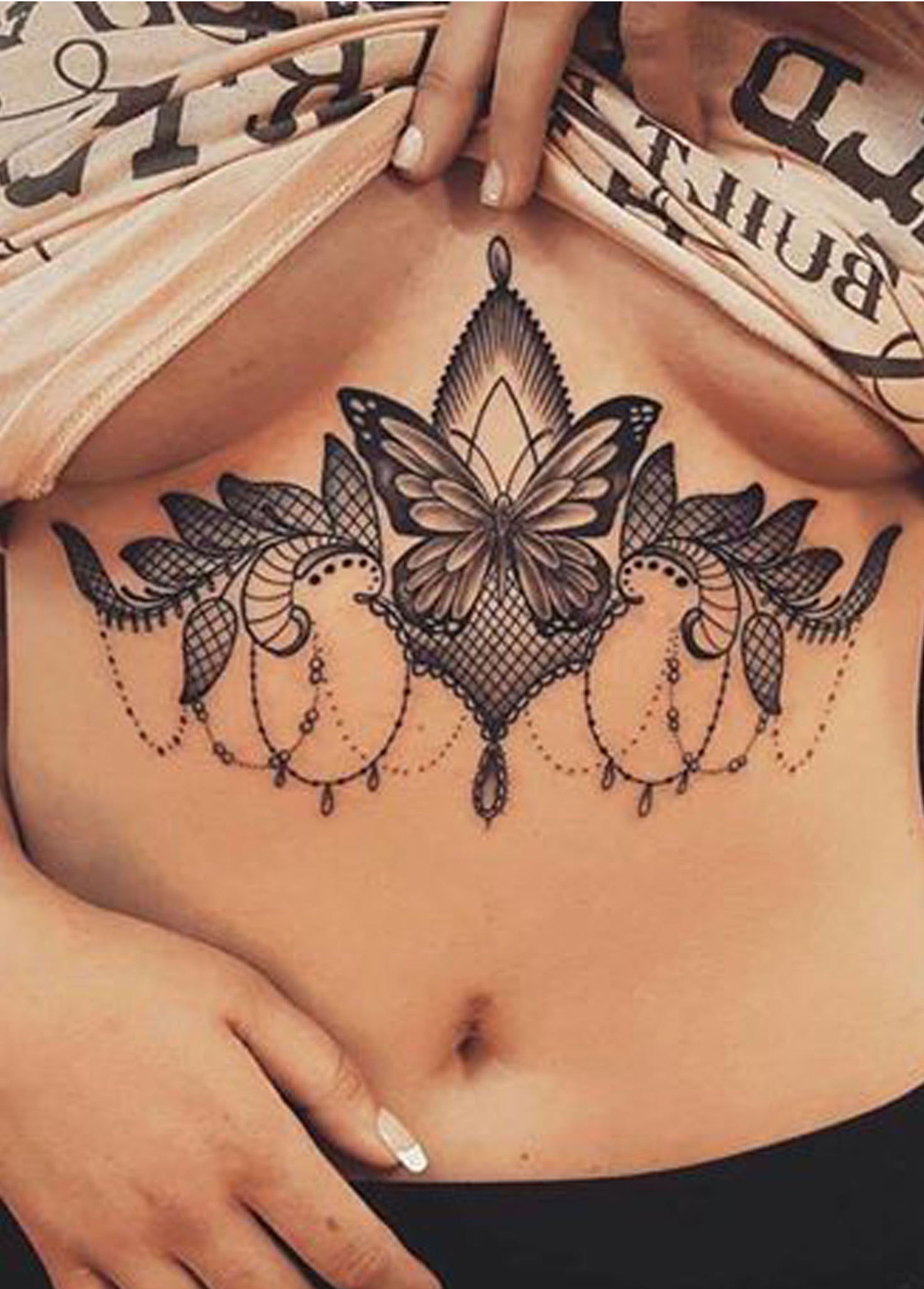 Women's Unique Butterfly Sternum Tattoo Ideas - Cool Chandelier Lace Chest Tat -  ideas de mariposas esternón tatuaje para mujeres - www.MyBodiArt.com #tattoos