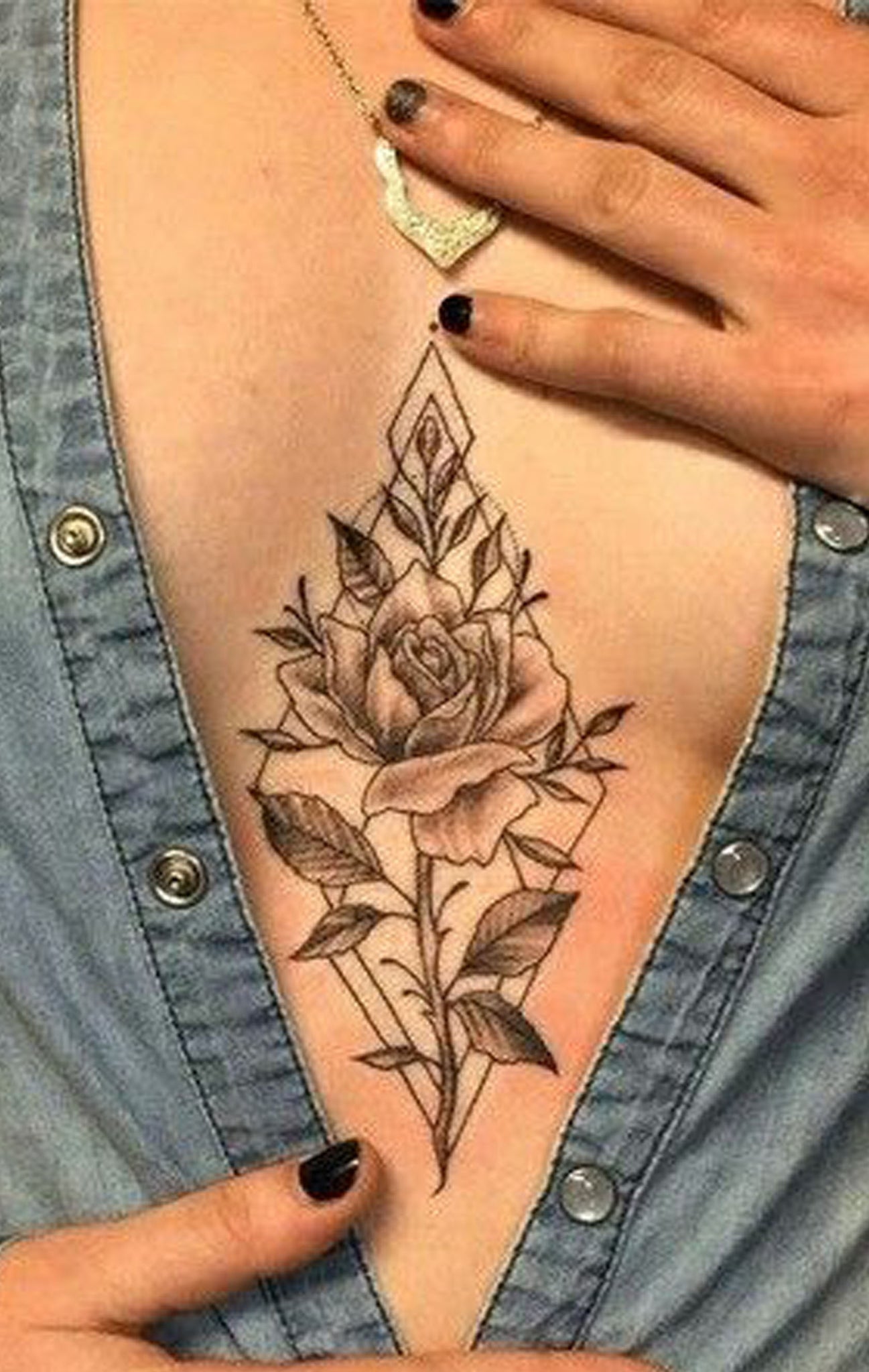 Vintage Wild Rose Sternum Tattoo Ideas for Women - Delicate Black Floral Flower Chest Tat -  ideas de tatuaje de esternón rosa para mujeres - www.MyBodiArt.com #tattoos