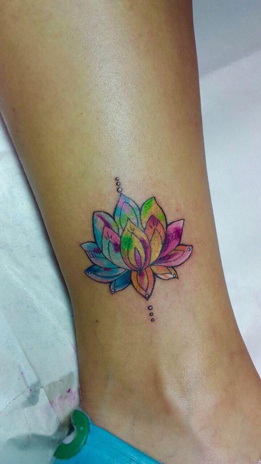 Watercolor Lotus Ankle Tattoo Placement Ideas for Women at MyBodiArt.com