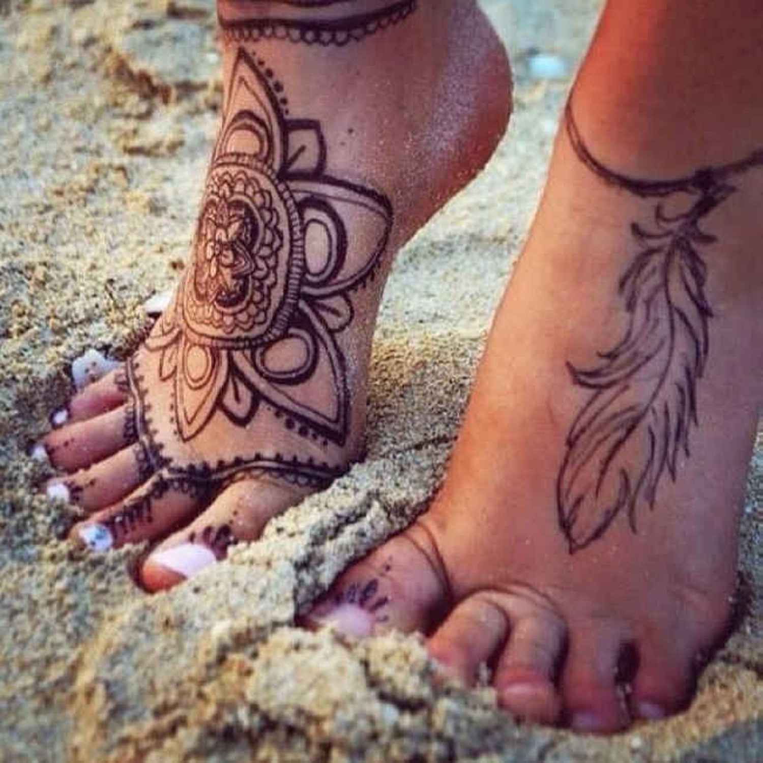 Brown Henna Indian Feather Tribal Mandala Foot Tattoo Ideas for Women at MyBodiArt.com