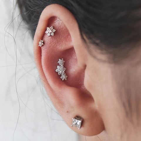 Crystal Flower Ear Piercings at MyBodiArt