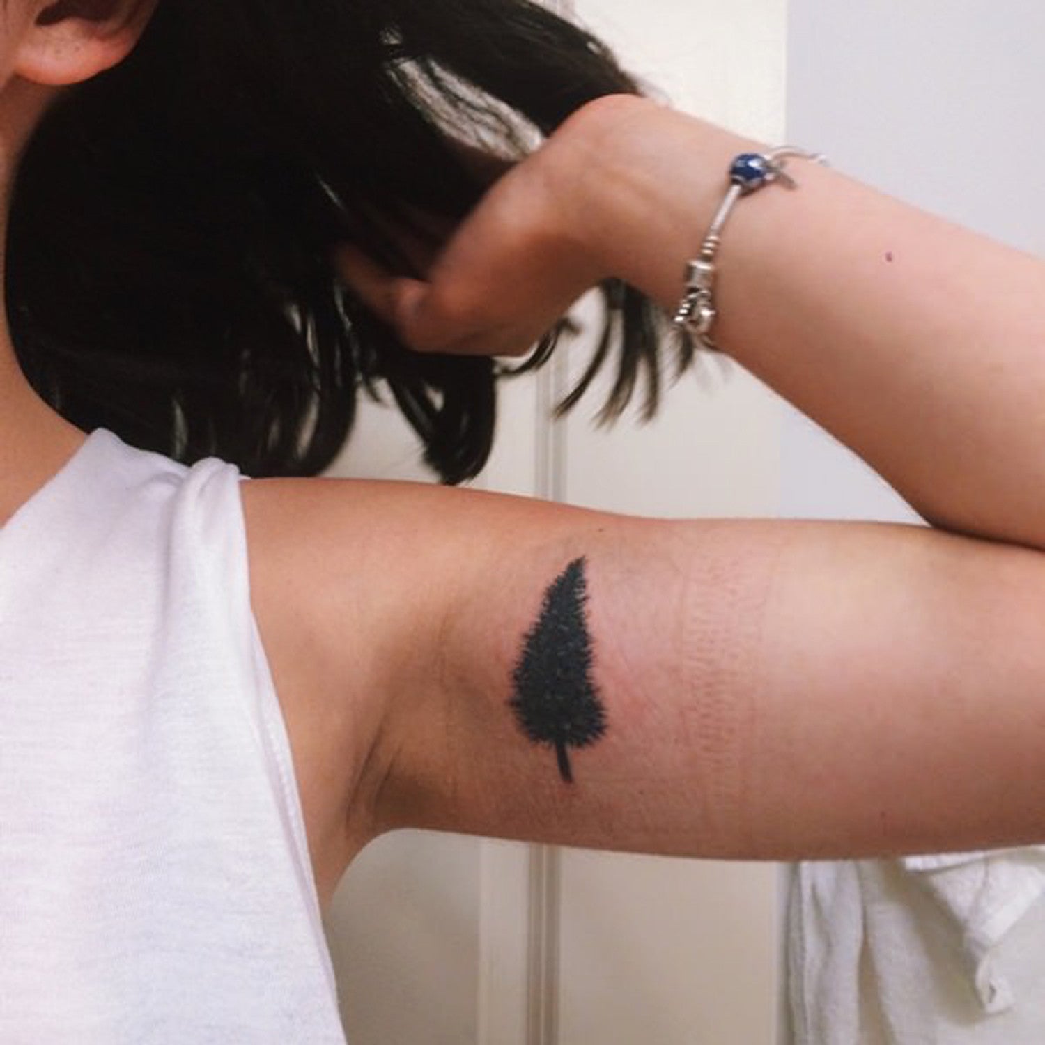 Evergreen Pine Tree Bicep Arm Tattoo Silhouette Tatouage - MyBodiArt.com