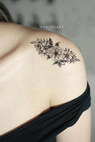 Expressive Black Flower Shoulder Tattoo