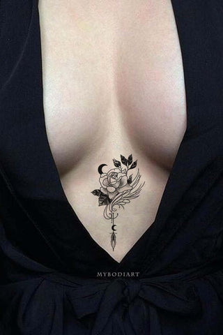 Expressive Single Black Rose Sternum Tattoo