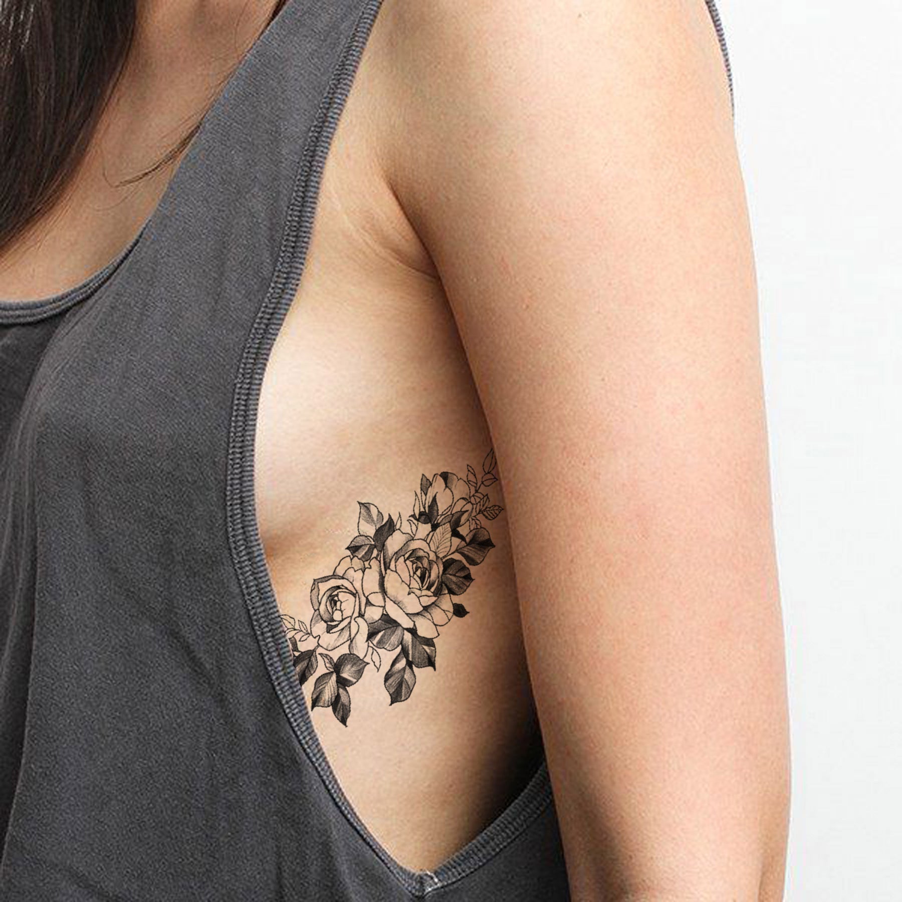 Lotus flower rib tattoo