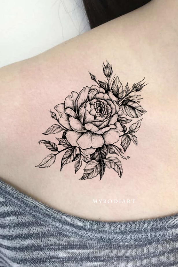 Create a black tattoo featuring intricate and realistic botanical elements  like flowers, leaves, or branches, using shading and negative space to add  depth. additional keywords: botanical realism, chiaroscuro, delicate  shadows, flora and