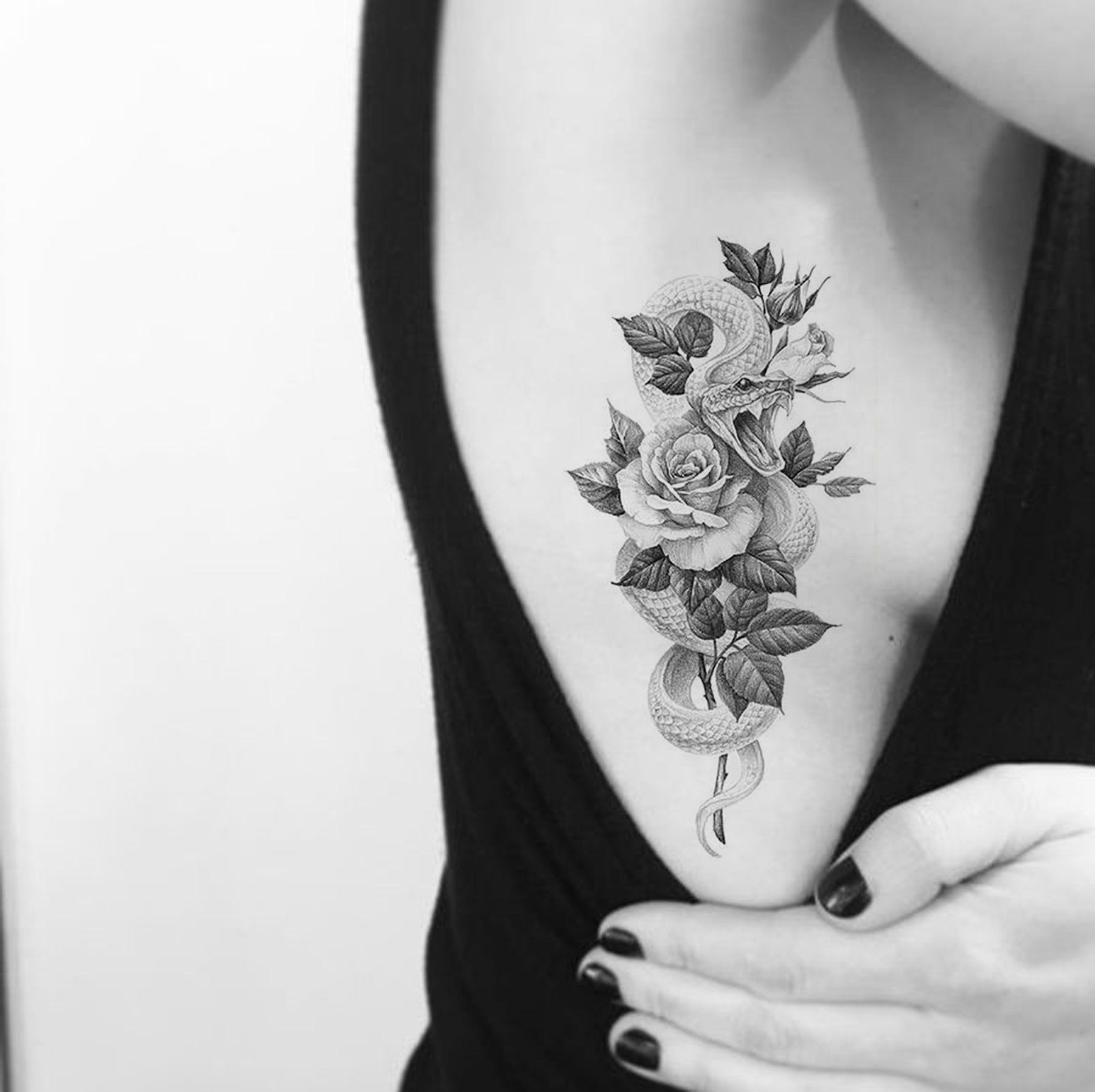 Fineline Floral Ribcage Tattoo by Stephanie  TattooNOW