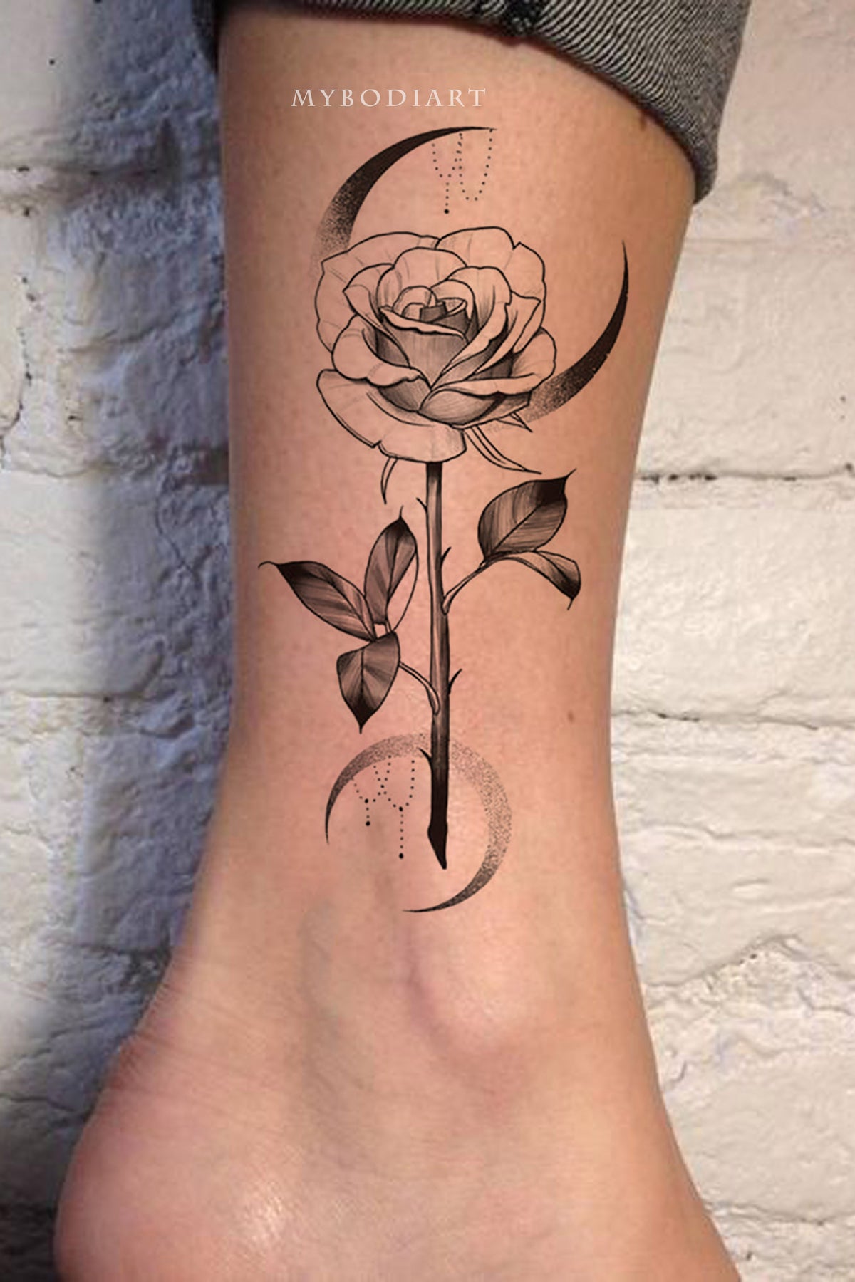 Crescent Moon Shaped Roses Tattoo by Natan Alexander 