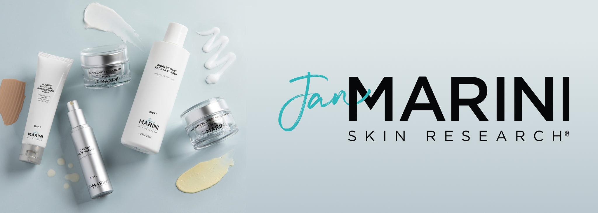 Several Jan Marini skincare products laying on a pale blue background with the Jan Marini Skincare Research logo to the right.