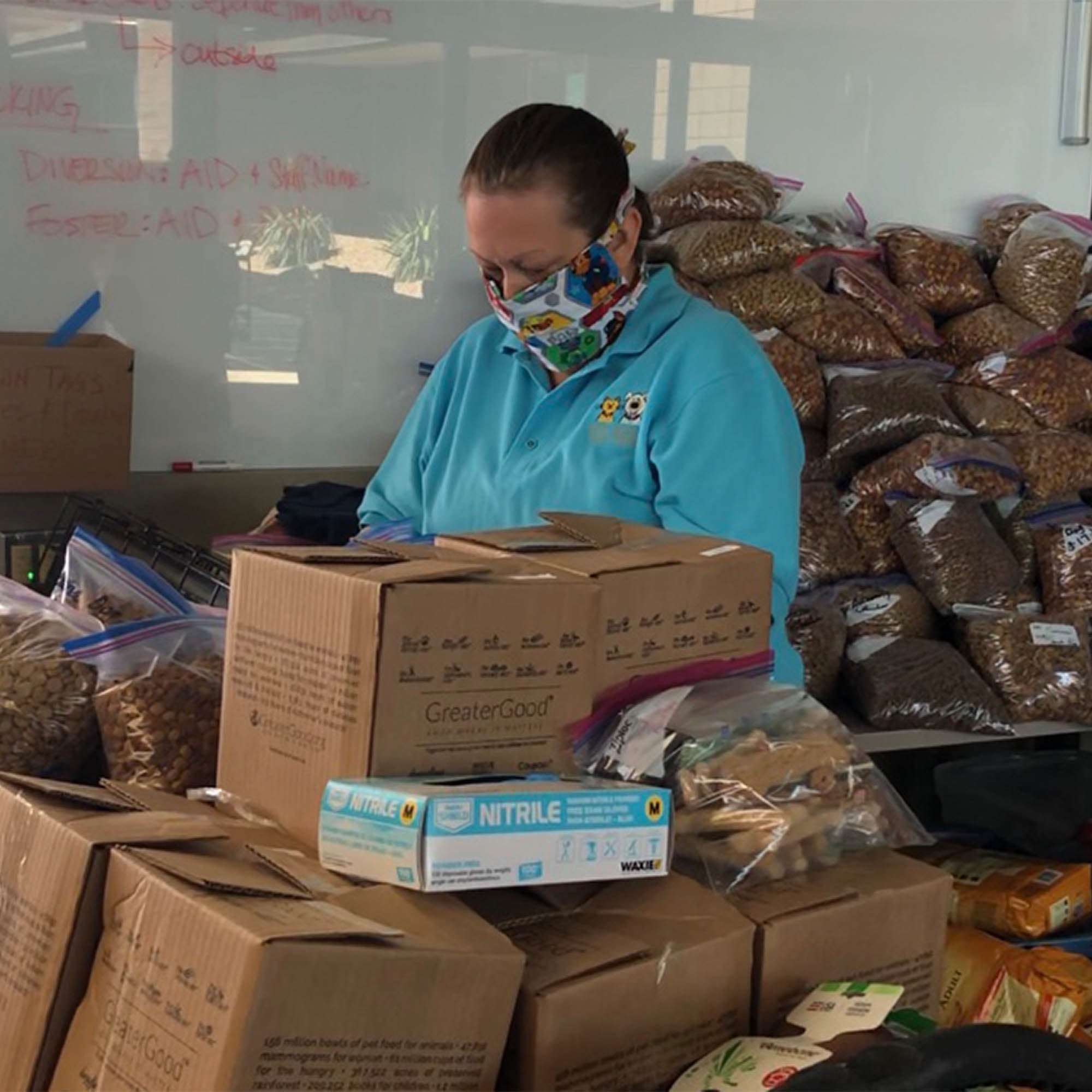 Distribution team prepares Emergency Kits