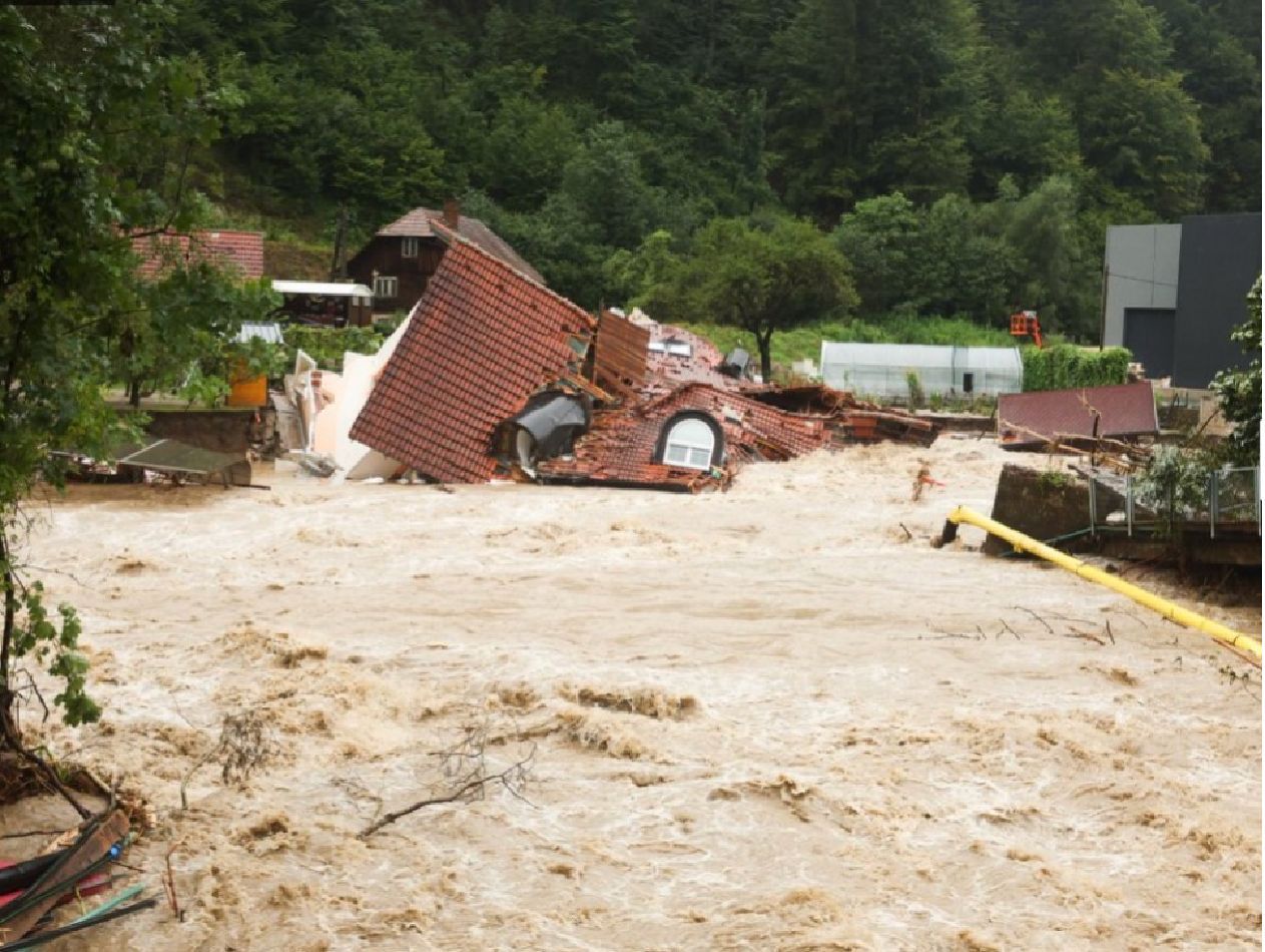 House swept away in flood waters in Slovenia