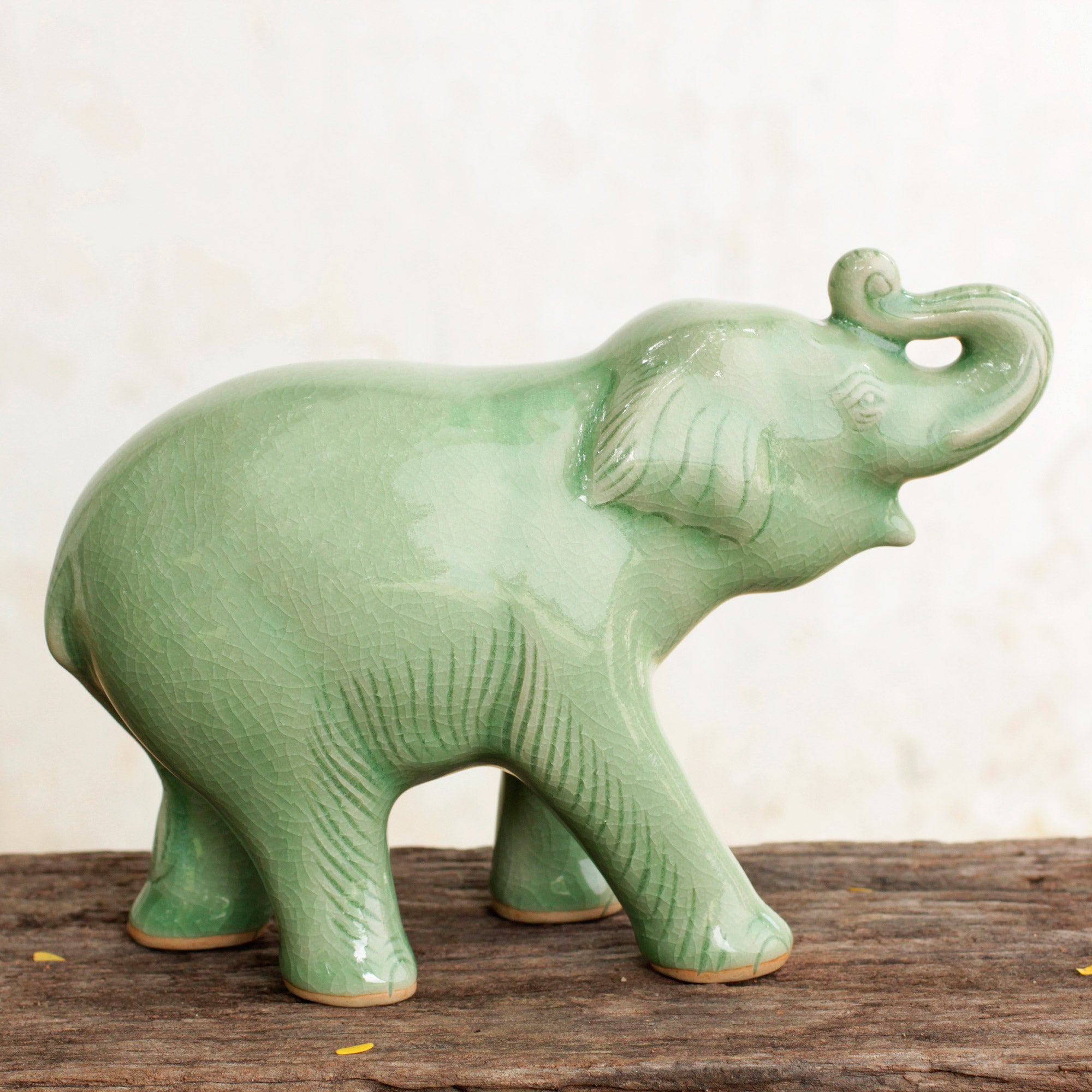 NOVICA Laughing Elephant Thai Artisan Crafted Celadon Ceramic Elephant Figurine
