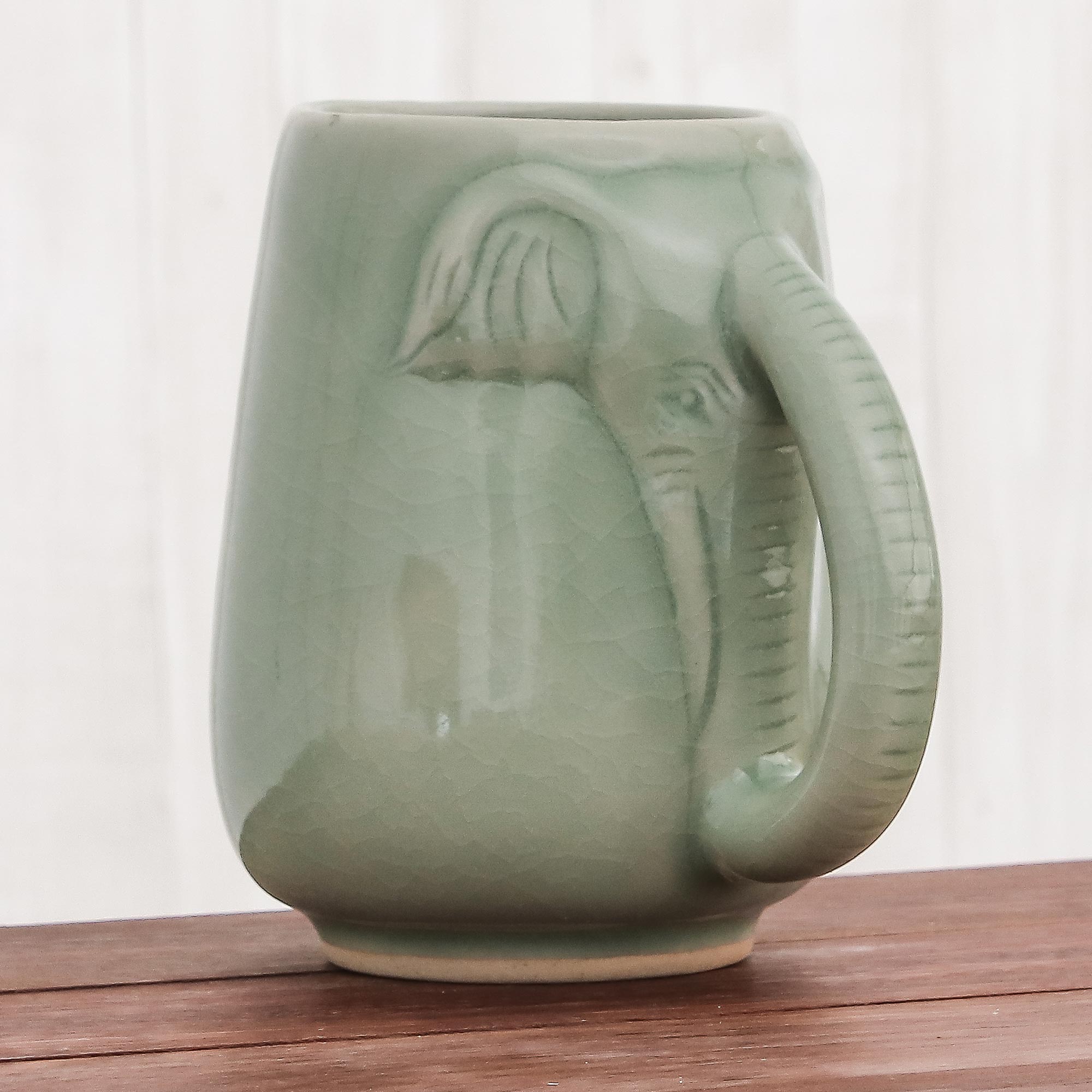 NOVICA Morning Elephant in Green Ceramic Celadon Elephant Mug in Green from Thailand