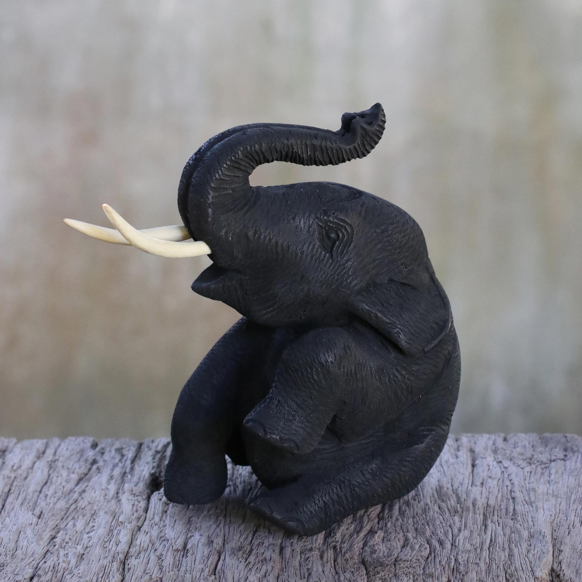 NOVICA Joyous Elephant Black Teakwood Wood Sculpture