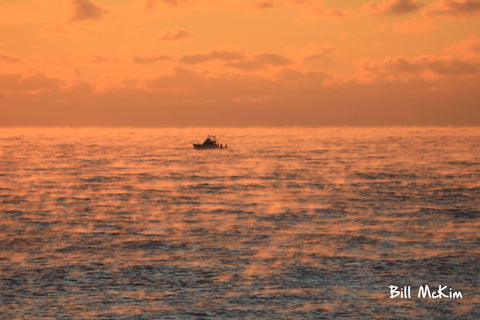 sea smoke sunrise 