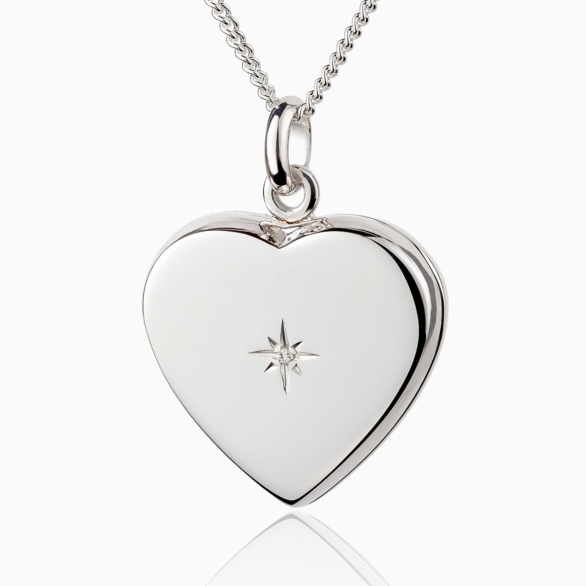 silver heart locket with diamond