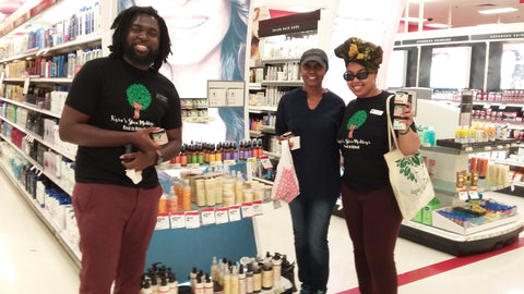 Kyra, John and customer at Target with products on shelf