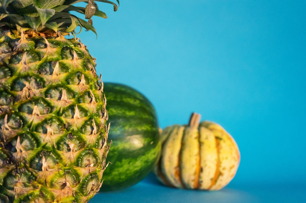 Best kitchen knives: a pineapple, watermelon, and squash
