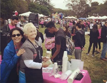 DR. SUSAN LOVE RESEARCH FOUNDATION AND LOVE WALK PHOTO POURING WEAVER'S ASTRAL BLEND COFFEE AT THE LOVE WALK