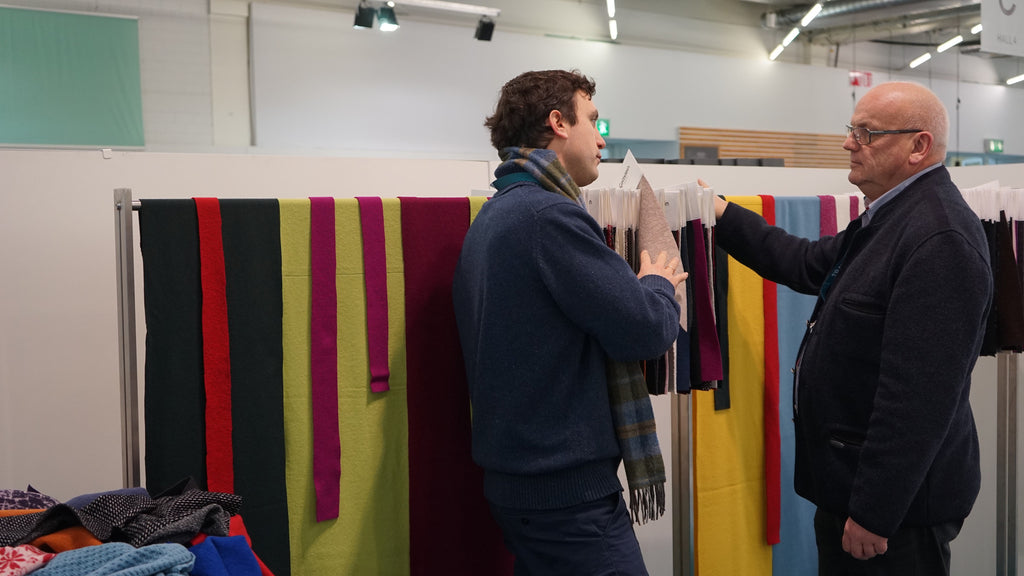 Robert W. Stolz inspecting 100% knitted Loden wool from the Austrian fabric maker Gottstein in Munich 