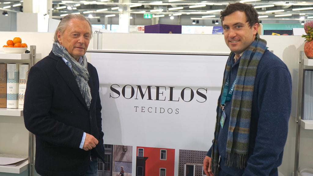 Robert W. Stolz standing with Peter Unger from the Portuguese shirt fabric maker, Somelos Tecidos in Munich