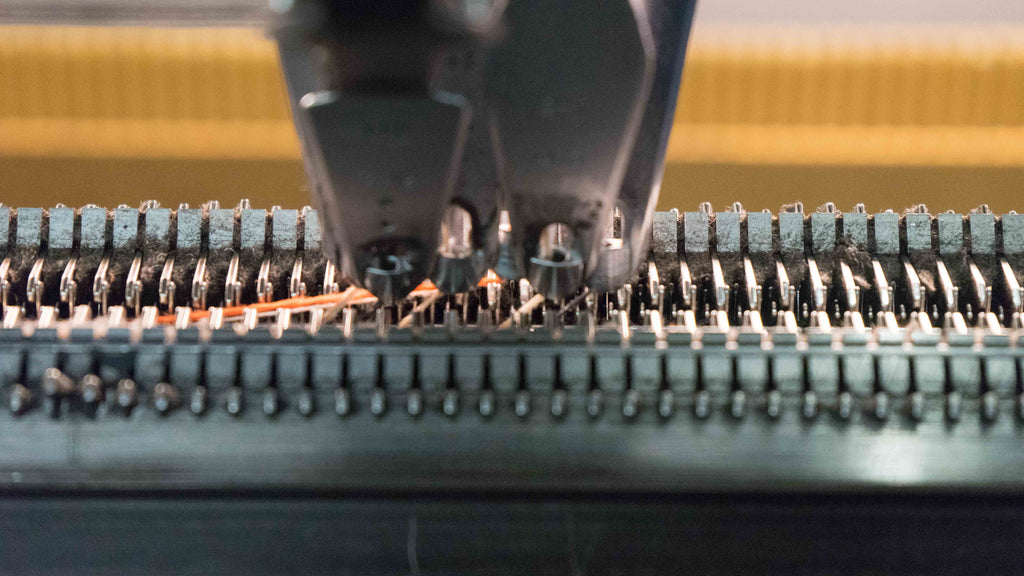 needles of a knitting machine in operation