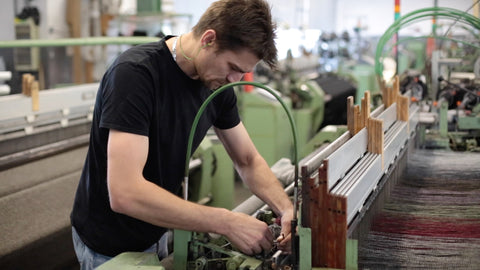 man on loom close shot