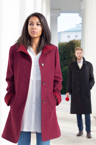 young women wearing red funnel coat