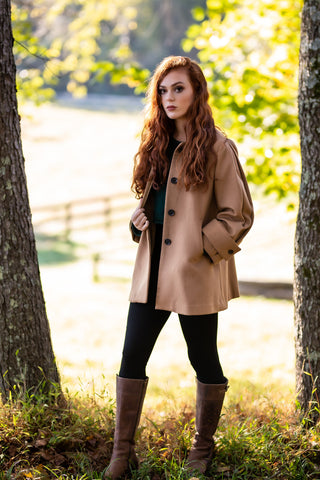 red haired woman wearing desert beige robert w stolz loden coat in potomac maryland