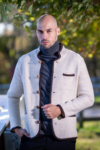 man wearing traditional austrian boiled wool jacket with brown trim from Robert W. Stolz