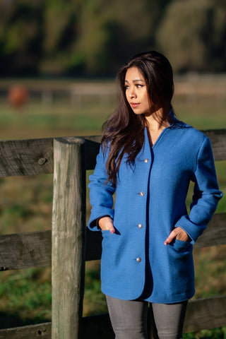 young women wearing light blue boiled wool austrian jacket by Robert W. Stolz