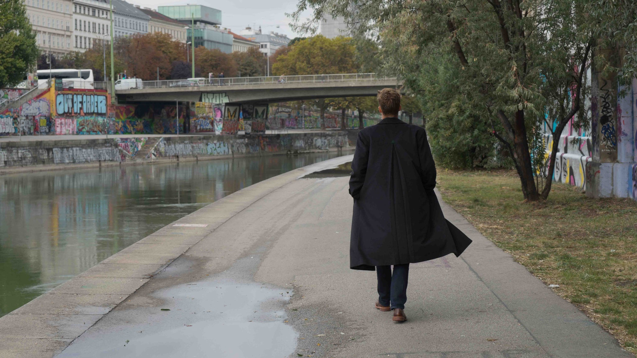 October 8th 2016 photo shoot with photographer Astrid Schweyer in Vienna, Austria featuring the Robert W. Stolz long loden overcoat taken next to the Donau Canal