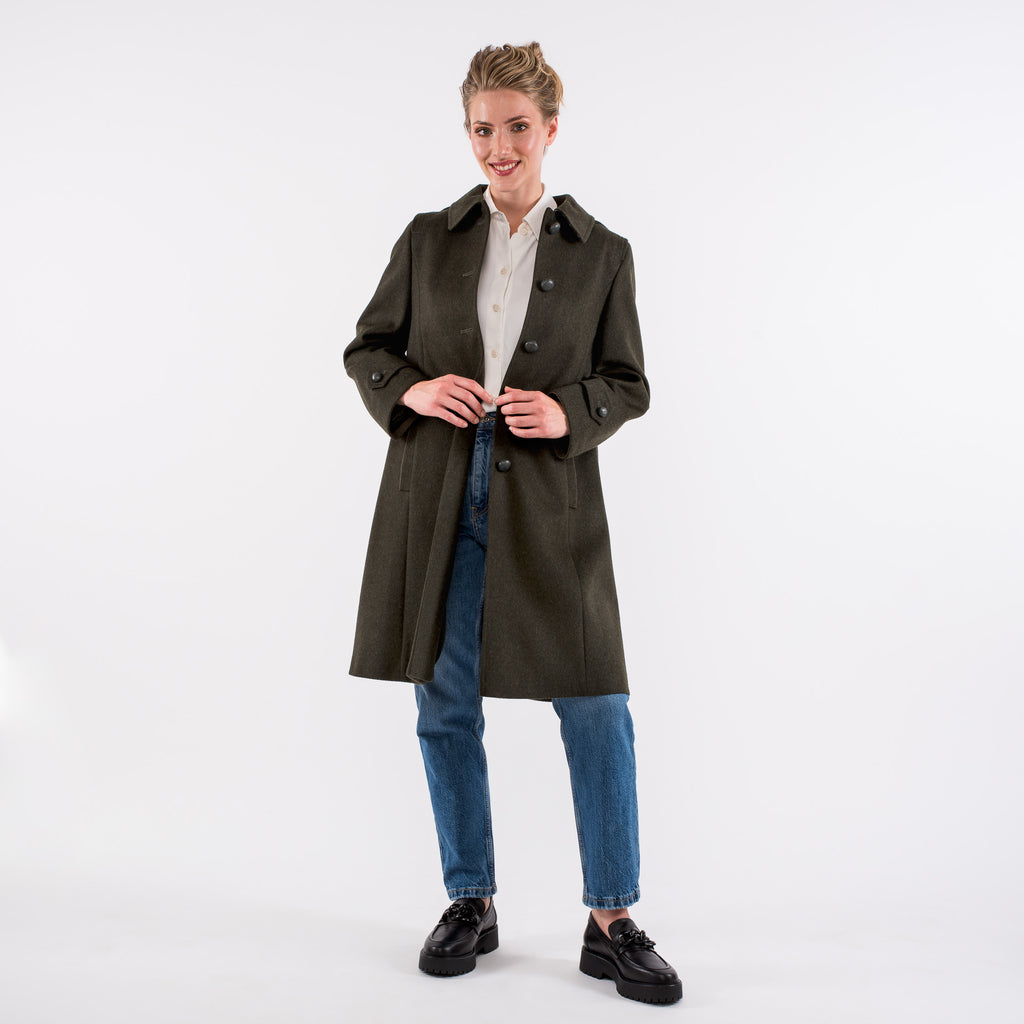 short woman wearing petite loden coat