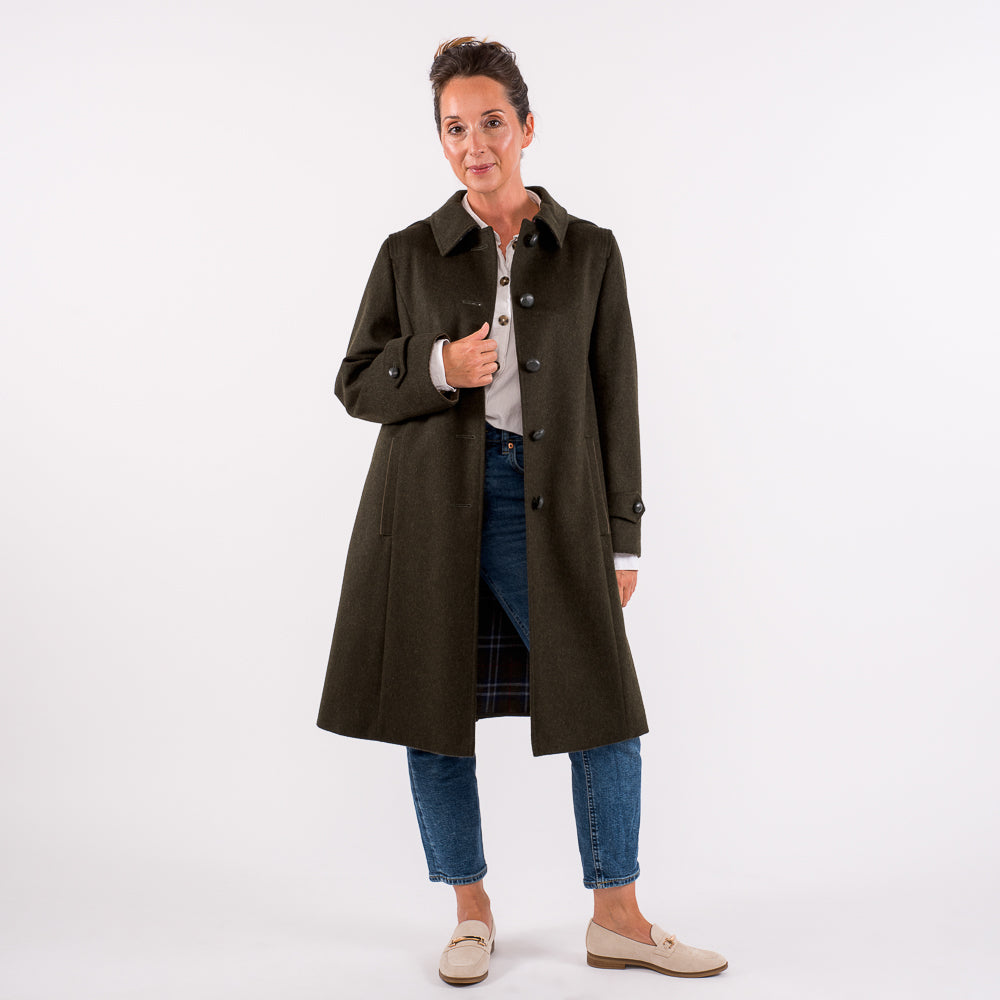 brown haired short women wearing petite loden coat