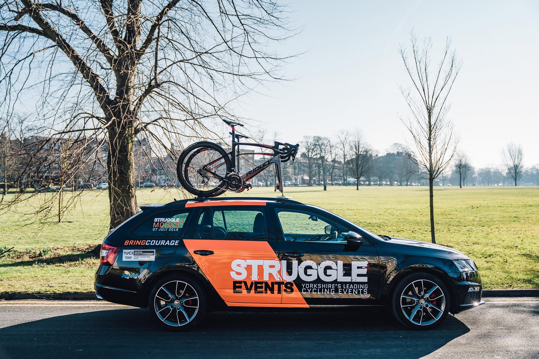 Mechanical support car for corporate cycling event