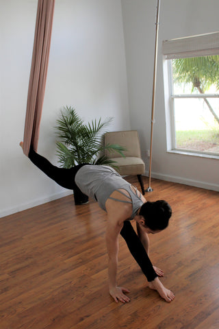 Girl doing Reverse Splits