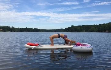 Sonya Cousino SUP Yoga on a lake