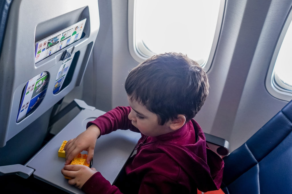 Tips for airplane travel with kids and families with children