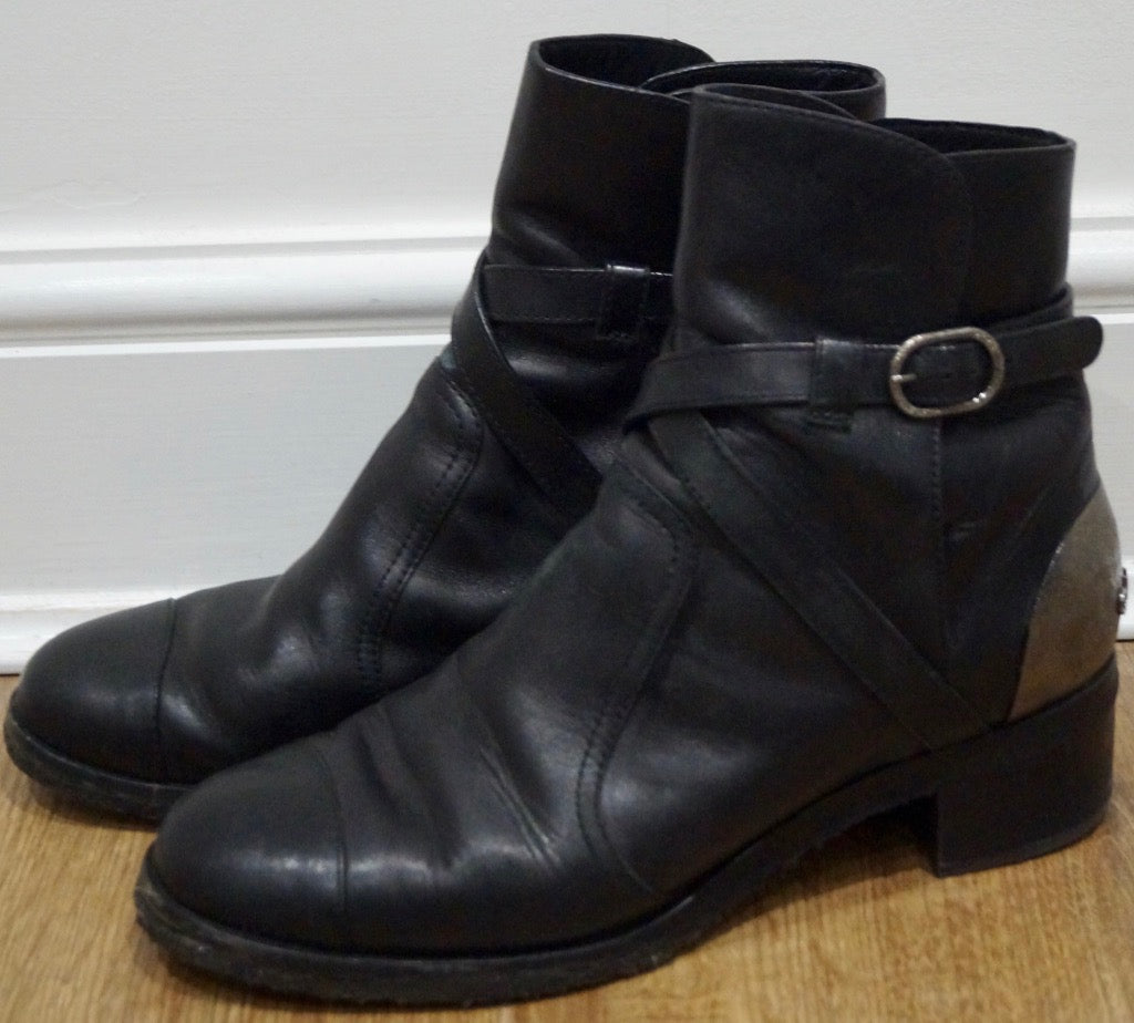 black ankle boots with silver buckles