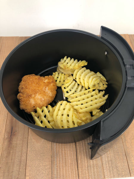 Chicken breast filet and waffle fries in an Uber Air Fryer XL Basket