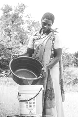 Pouring the Original Marula Juice back to the Marula pulp