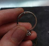 Clear Nail polish to make ring fit better?