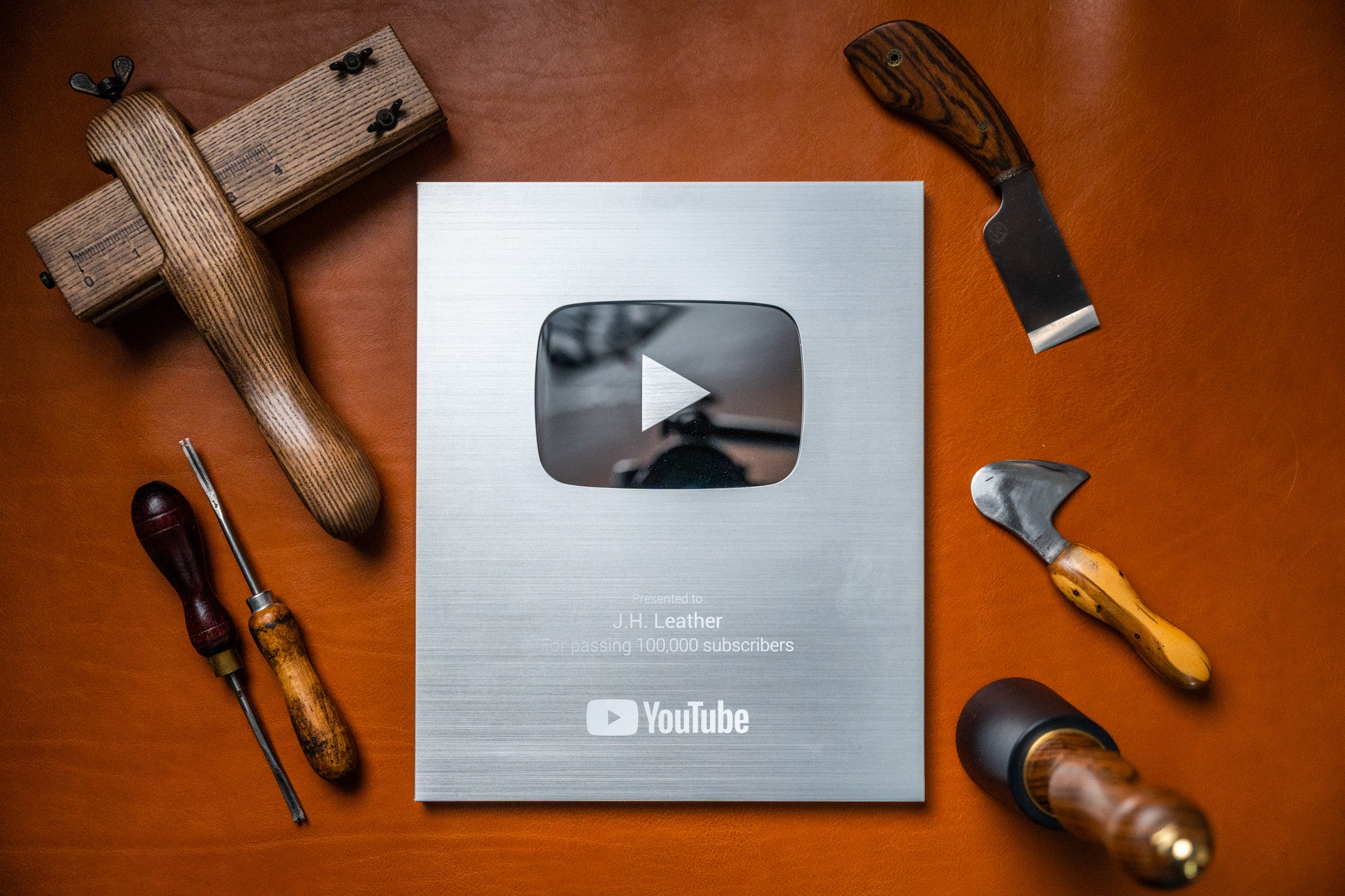 J.H.Leather's Silver YouTube Play Award for 100,000 subscribers