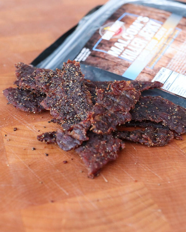 https://cdn.shopify.com/s/files/1/1190/2102/products/malcoms-jerky-dang-good-jerky-686972_600x.jpg?v=1681742766