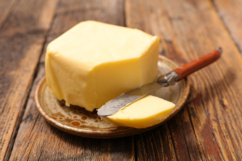 stick of butter with knife