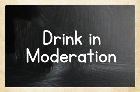 drink in moderation written on chalkboard